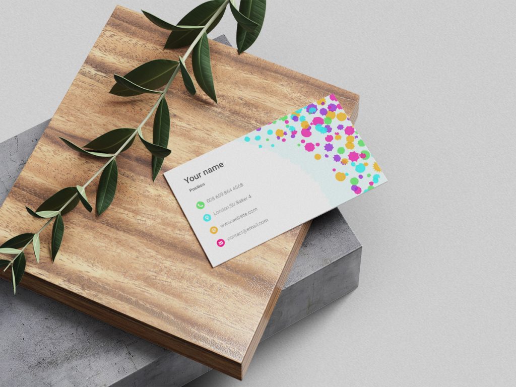 business card with wood block and leaf