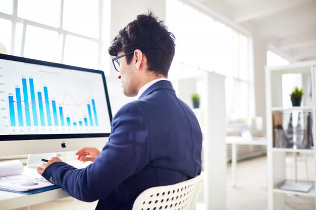 image having a man working with computer