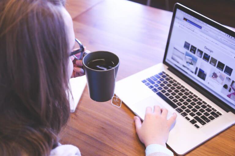 girl with laptop and coffee